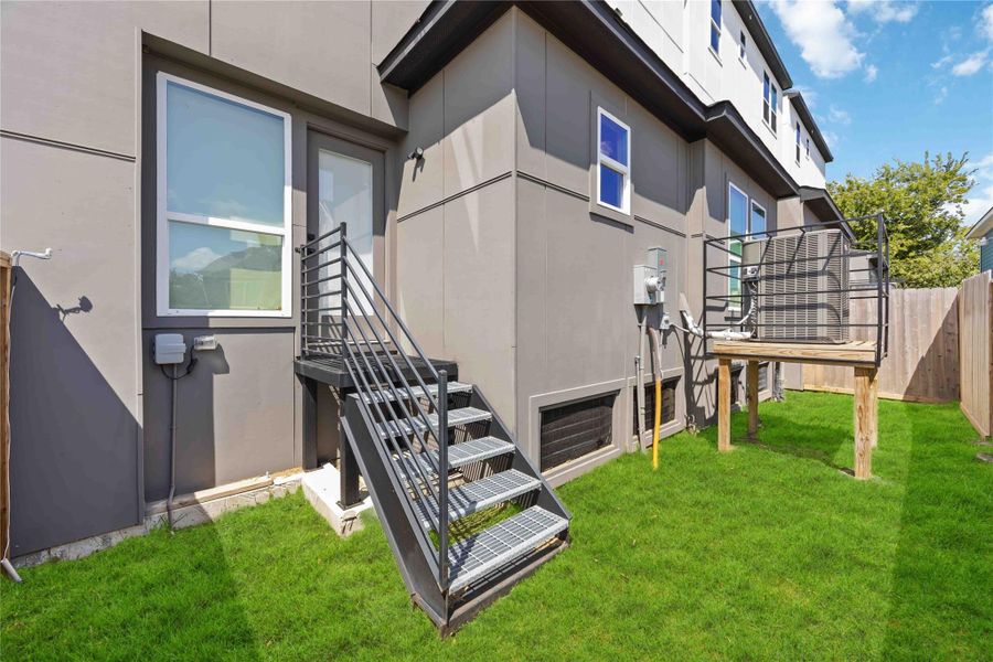 Exterior details and patio area of a home in , Houston (Image 3). Exterior details and patio area of a home in , Houston (Image 3).