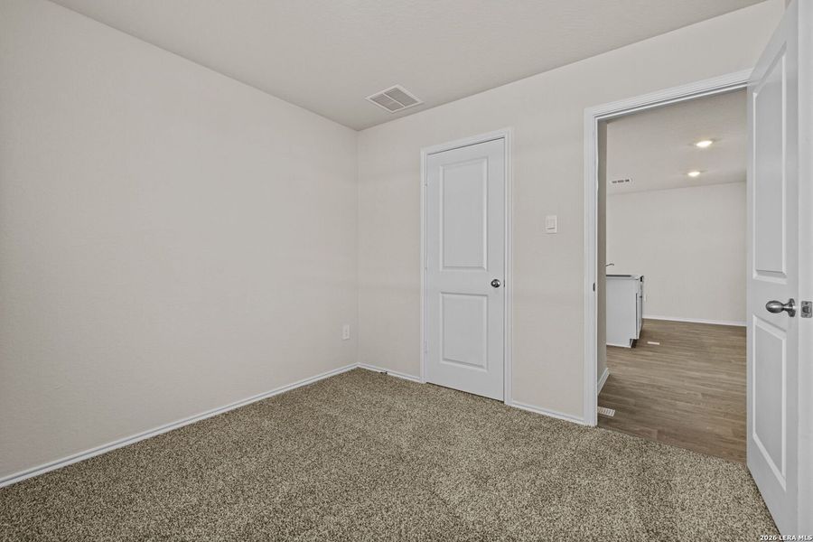 Spacious, unfurnished interior of a new home in Navarro Fields, Seguin (Image 13).
