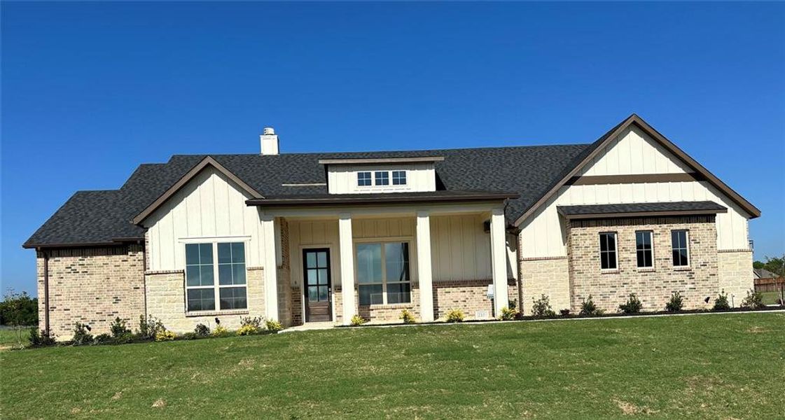 Front exterior of a new home in , Decatur, TX, highlighting curb appeal (Image 13). Front exterior of a new home in , Decatur, TX, highlighting curb appeal (Image 13).
