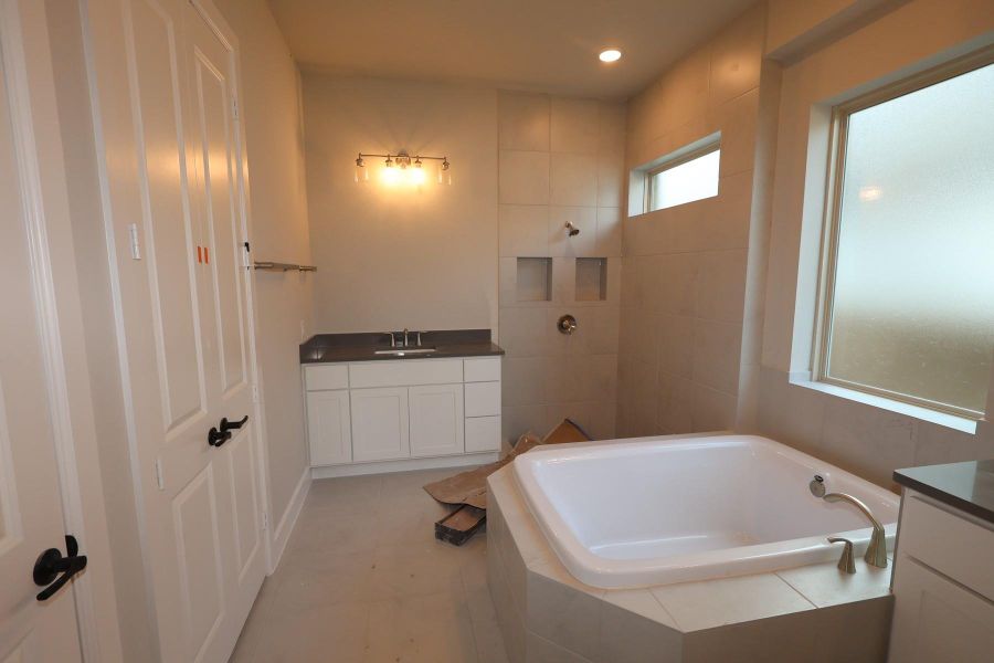 Furnished interior view inside a new home in , Conroe (Image 6).