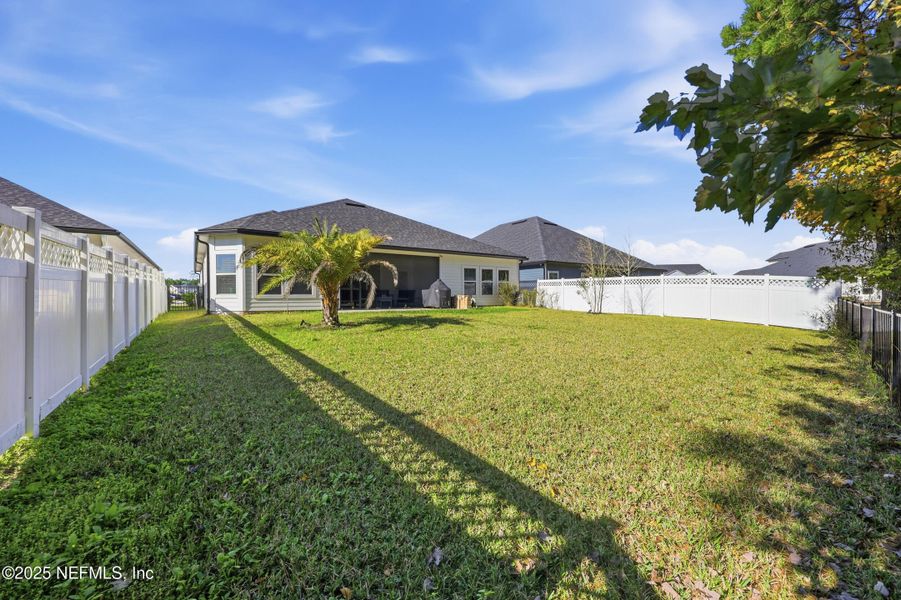 Exterior details and patio area of a home in Silver Landing at SilverLeaf, St. Augustine (Image 33).