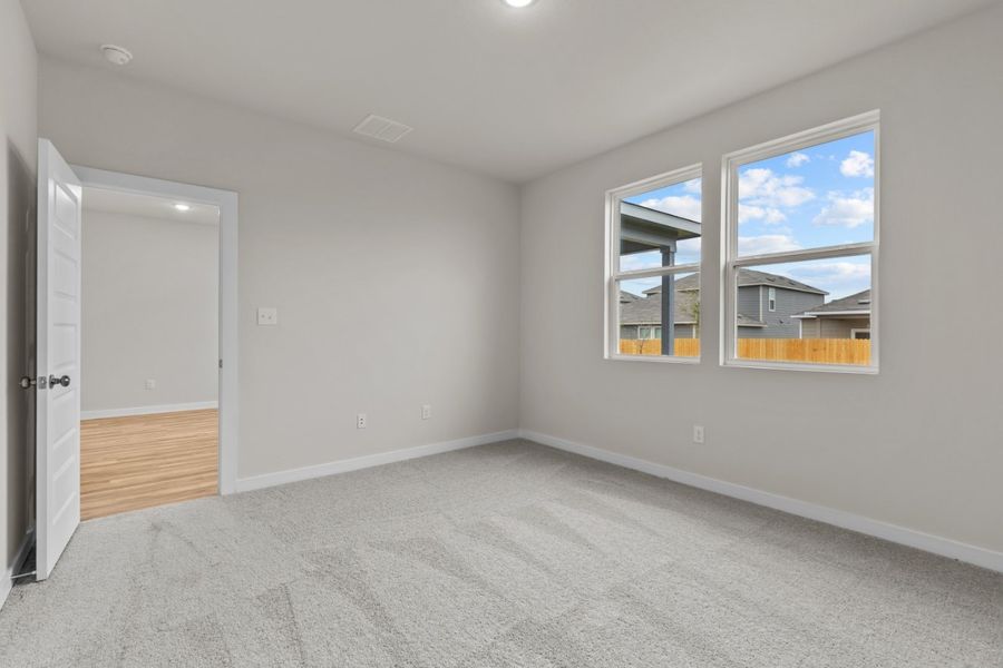 A room with a window and a door. A room with a window and a door.