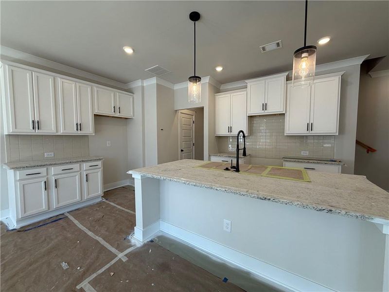 In-progress construction of a new home in The Towns at Auburn Station East, Auburn, GA (Image 17).