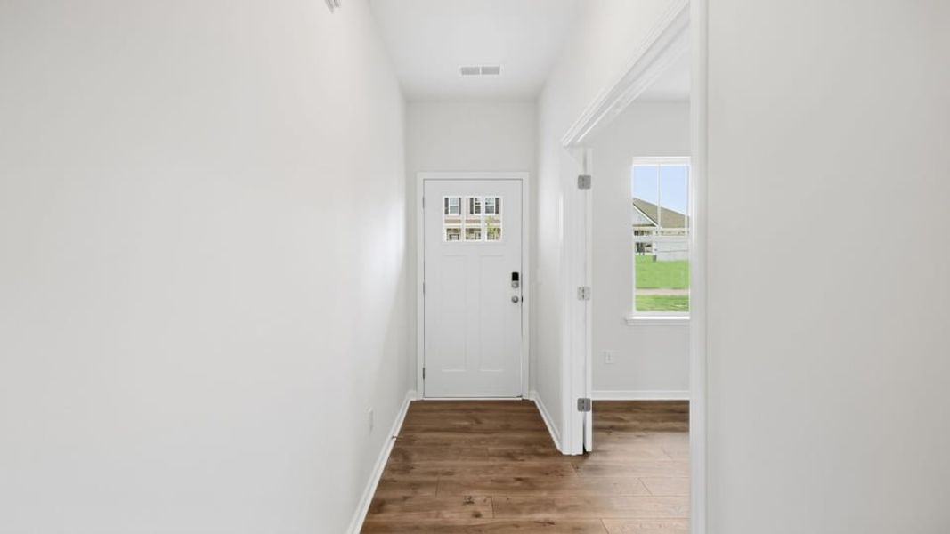 Spacious, unfurnished interior of a new home in Durbin Meadows Traditions, Fountain Inn (Image 19).