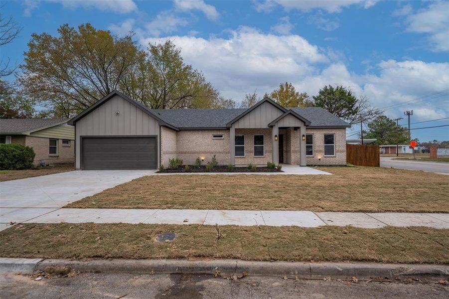 Front exterior of a new home in , Grand Prairie, TX, highlighting curb appeal (Image 23). Front exterior of a new home in , Grand Prairie, TX, highlighting curb appeal (Image 23).