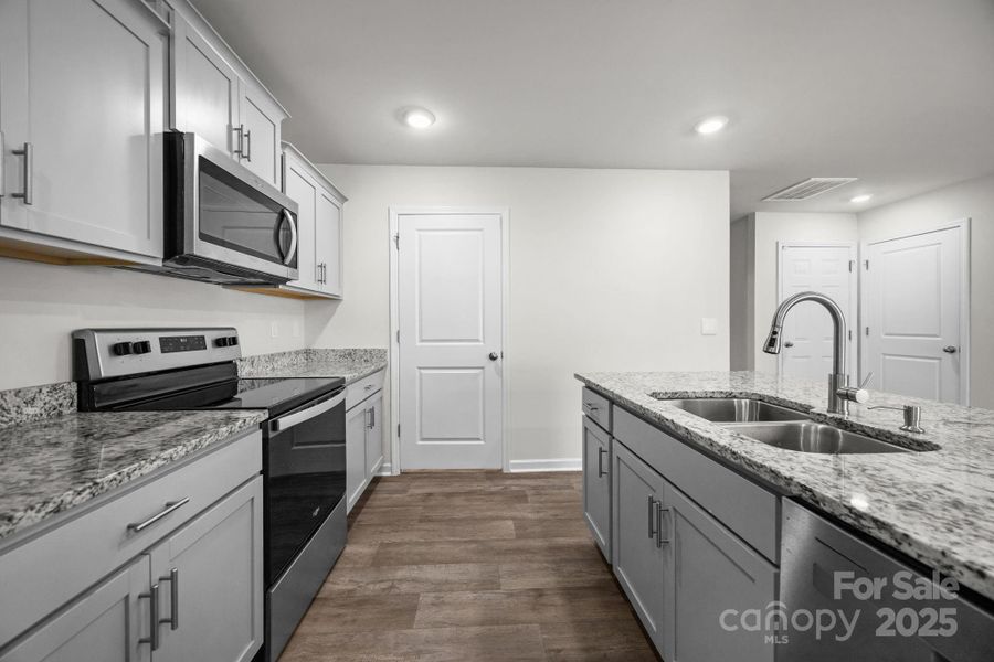 Furnished interior view inside a new home in , Mocksville (Image 14).