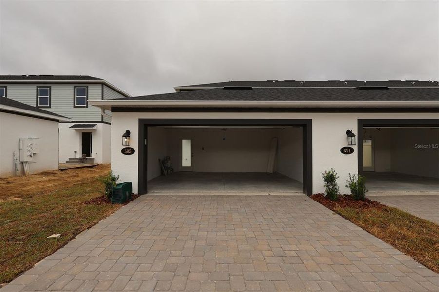 Exterior details and patio area of a home in Emerson Pointe, Apopka (Image 4). Exterior details and patio area of a home in Emerson Pointe, Apopka (Image 4).