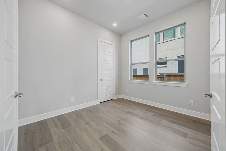 Spacious, unfurnished interior of a new home in The Grove Frisco, Frisco (Image 25).