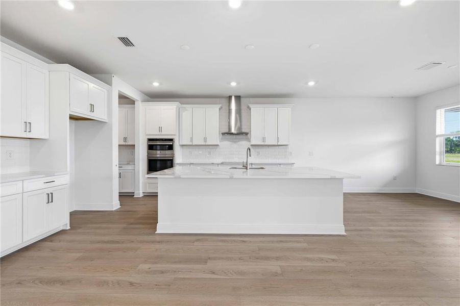Furnished interior view inside a new home in Creeks Edge at Twin Rivers, Parrish (Image 38).