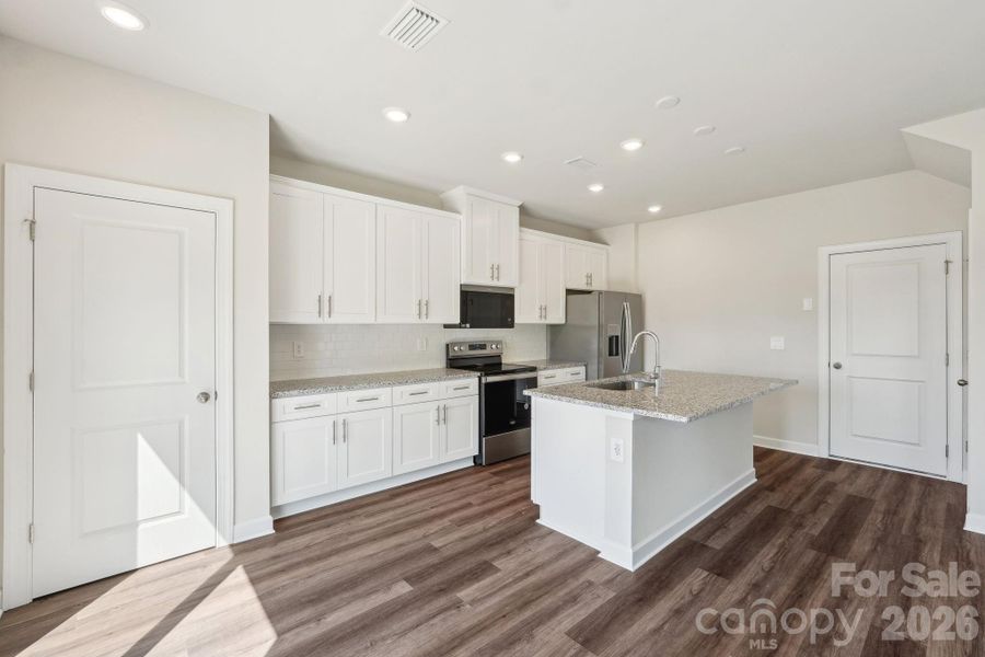 Photo is not of the actual home but is an inspirational photo of builder’s model home and may depict options, furnishings, and/or decorator features that are not included.