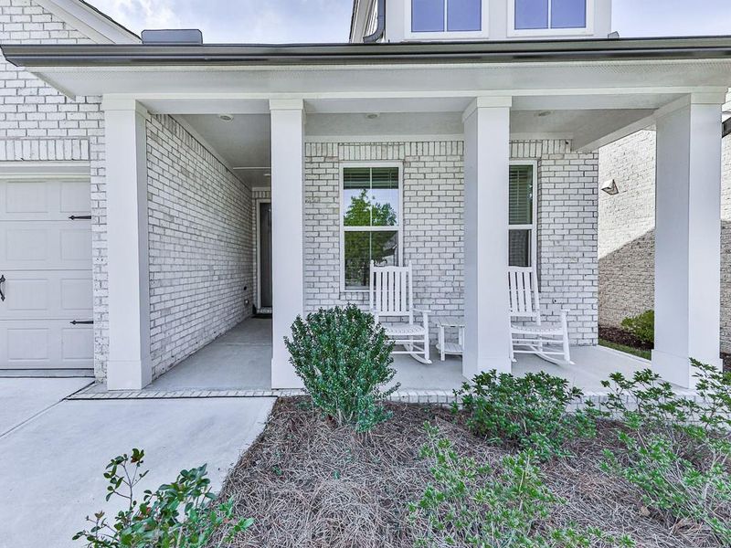Exterior details and patio area of a home in Glenhaven at Ridgewalk, Woodstock (Image 35).
