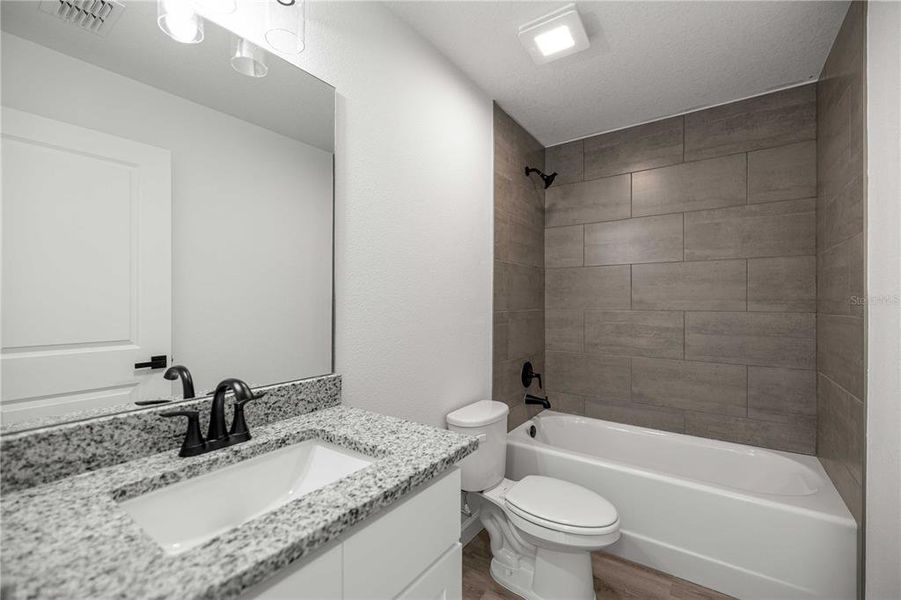 Furnished interior view inside a new home in , Dunnellon (Image 7).