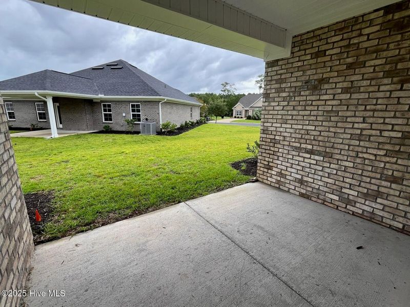 Front exterior of a new home in Palmetto Creek, Bolivia, NC, highlighting curb appeal (Image 2).