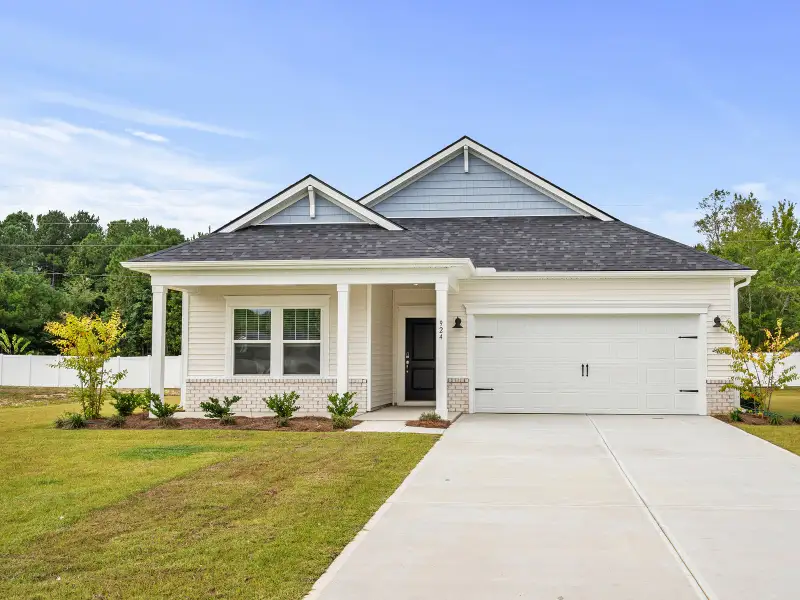 Representative exterior photo of a completed home built from the Buchanan by Meritage Homes in Creekside Point, Little River, SC (Image 1). Representative exterior photo of a completed home built from the Buchanan by Meritage Homes in Creekside Point, Little River, SC (Image 1).