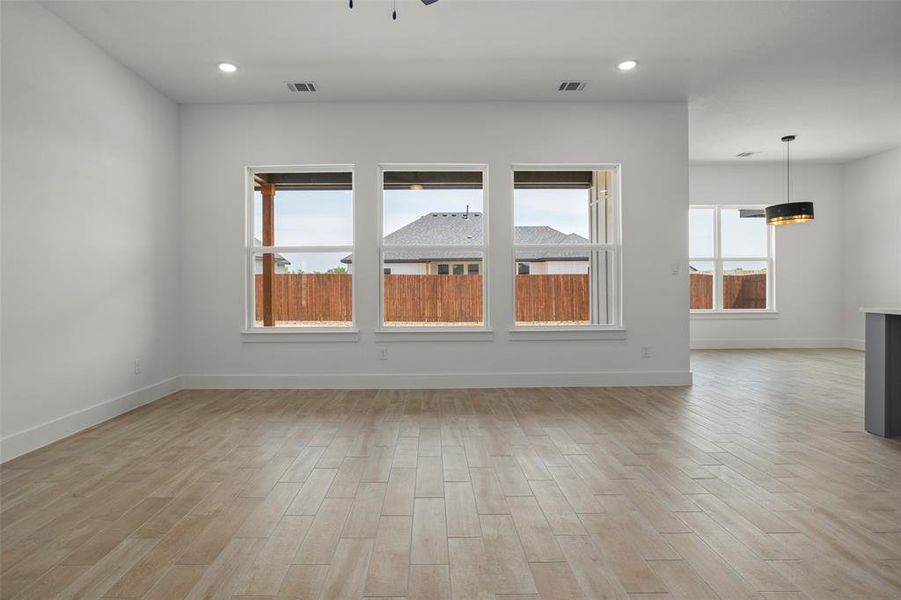 Unfurnished room featuring light wood-type flooring