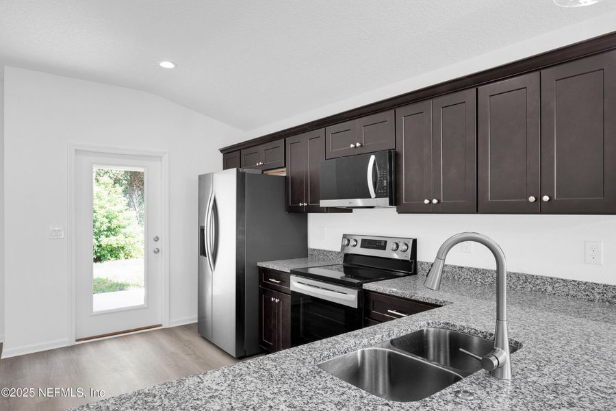 Furnished interior view inside a new home in , Green Cove Springs (Image 7).
