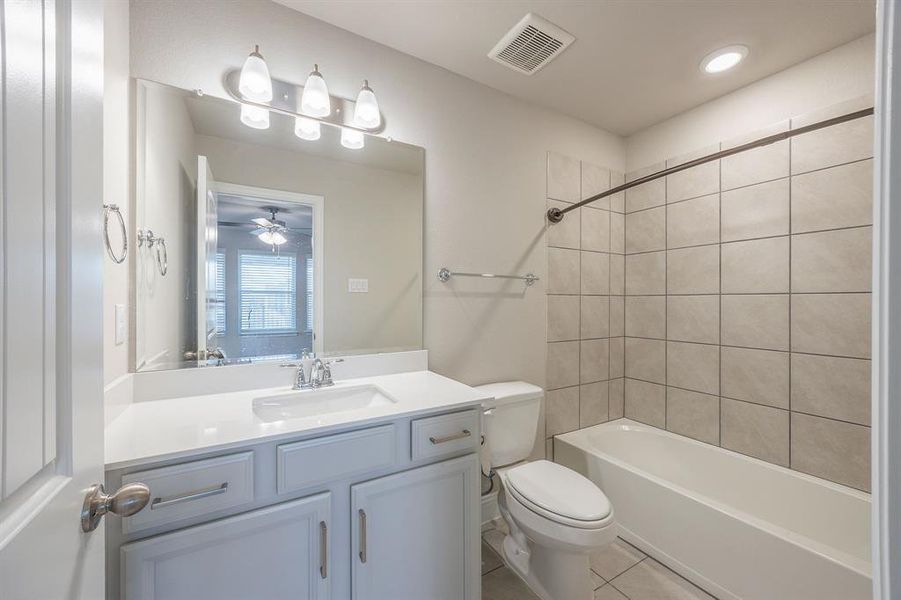 Secondary bathroom with quartz countertop - View