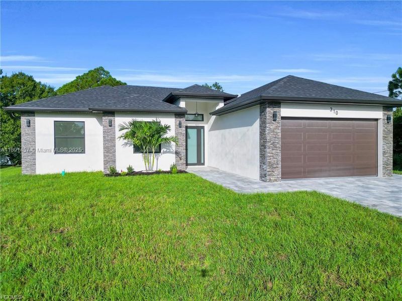 Exterior details and patio area of a home in , Lehigh Acres (Image 2). Exterior details and patio area of a home in , Lehigh Acres (Image 2).