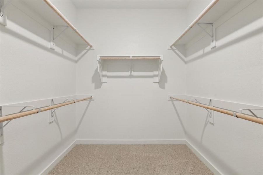 Primary Closet in the Masters home plan by Trophy Signature Homes – REPRESENTATIVE PHOTO Primary Closet in the Masters home plan by Trophy Signature Homes – REPRESENTATIVE PHOTO
