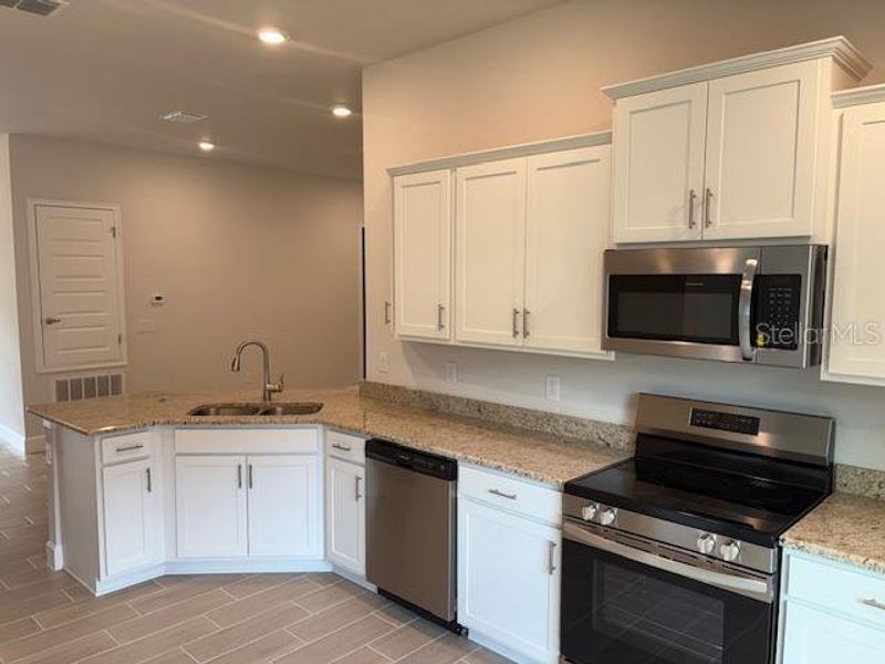 Furnished interior view inside a new home in Juliette Falls, Dunnellon (Image 4).