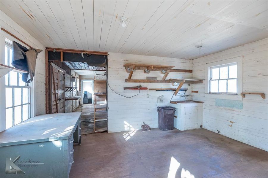 Misc room featuring wooden walls Misc room featuring wooden walls