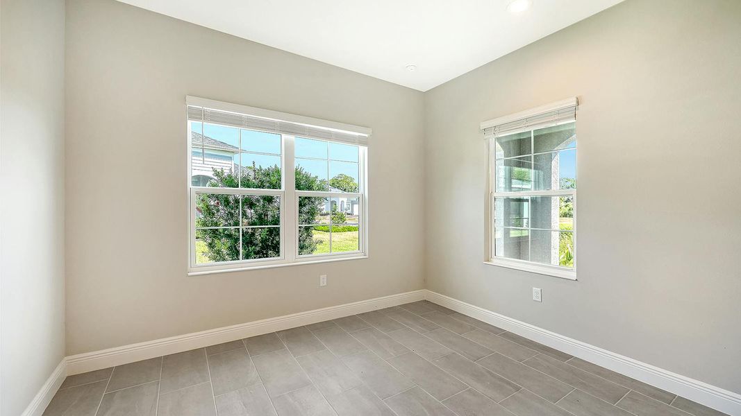 Spacious, unfurnished interior of a new home in Wildleaf Real Estate and Homes for Sale in Parrish, FL - Neal Communities, Parrish (Image 28).