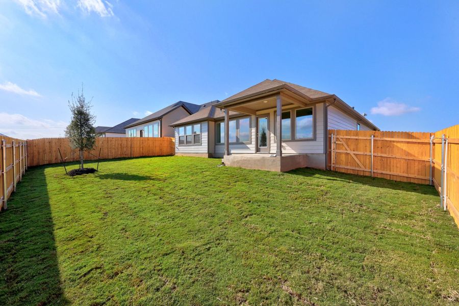 Exterior details and patio area of a home in Prairie Winds, Hutto (Image 19).