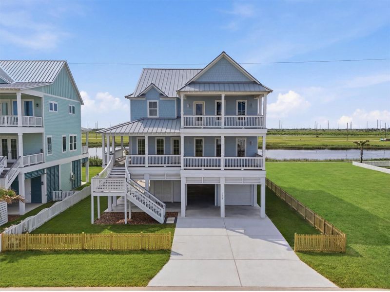 Front exterior of a new home in , Galveston, TX, highlighting curb appeal (Image 1). Front exterior of a new home in , Galveston, TX, highlighting curb appeal (Image 1).