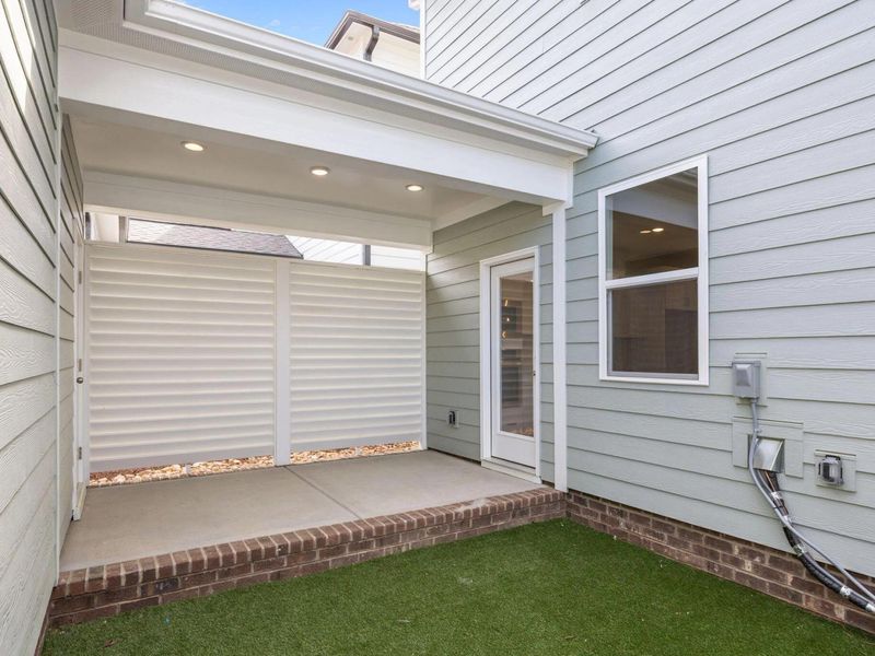 Exterior details and patio area of a home in Forestville Yard, Knightdale (Image 23).