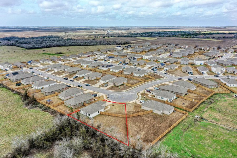 Aerial photo from behind the property with approximate property lines