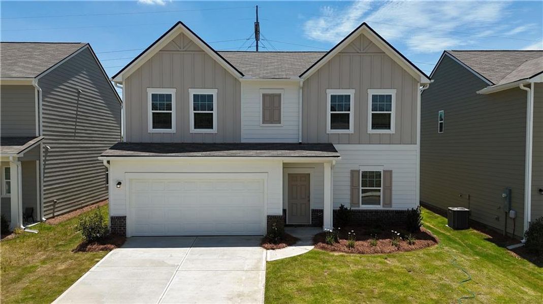 Front exterior of a new home in Casteel, Bethlehem, GA, highlighting curb appeal (Image 1). Front exterior of a new home in Casteel, Bethlehem, GA, highlighting curb appeal (Image 1).
