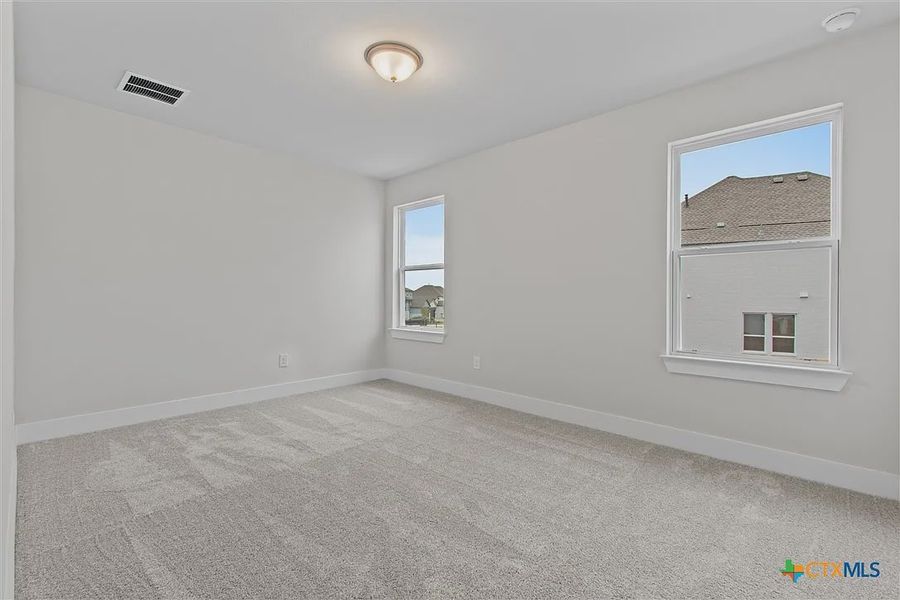 Spacious, unfurnished interior of a new home in Lakeside at Tessera on Lake Travis, Lago Vista (Image 25). Spacious, unfurnished interior of a new home in Lakeside at Tessera on Lake Travis, Lago Vista (Image 25).