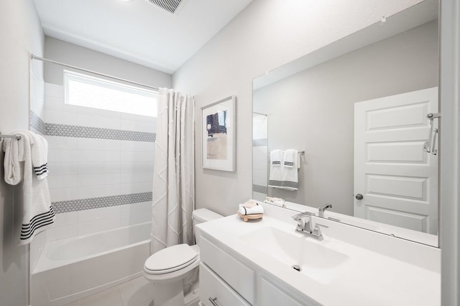 Representative furnished interior of a home built from the Verdin by Tri Pointe Homes in Pecan Ridge, Fulshear (Image 20).