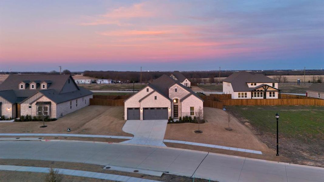 View of front of property featuring a garage