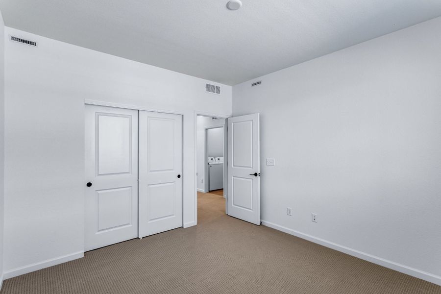 Spacious, unfurnished interior of a new home in Westside Crossing, Berthoud (Image 27).