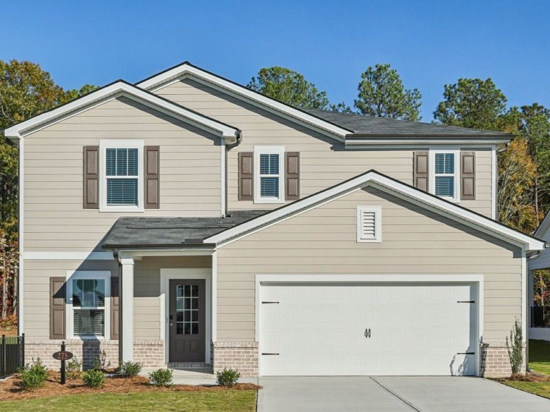 Front exterior of a new home in Ivey Township, Dallas, GA, highlighting curb appeal (Image 1).