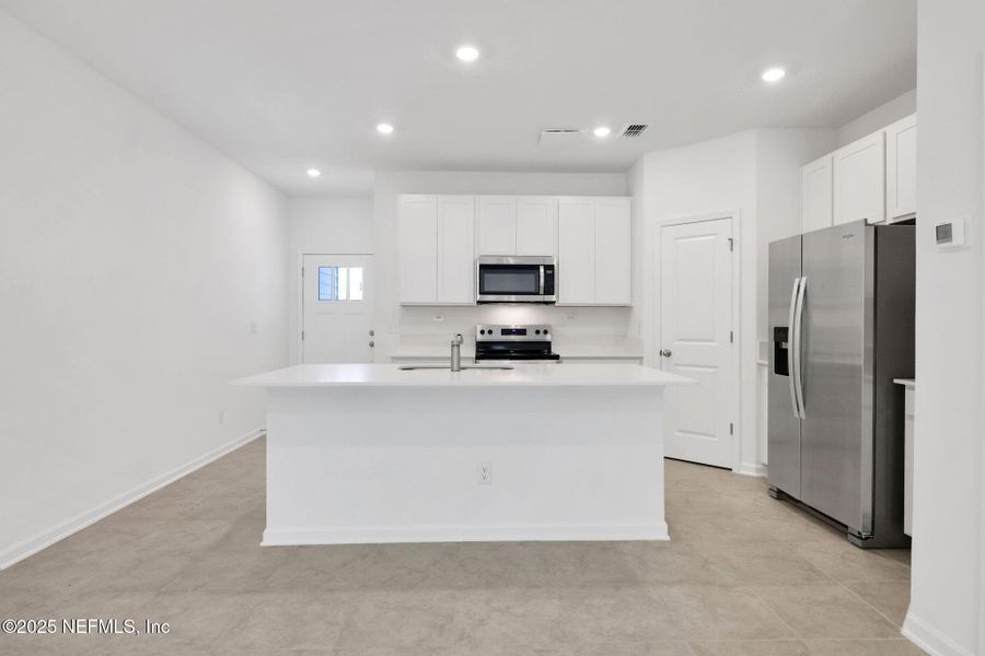Furnished interior view inside a new home in Atlantis Pointe, Middleburg (Image 11).