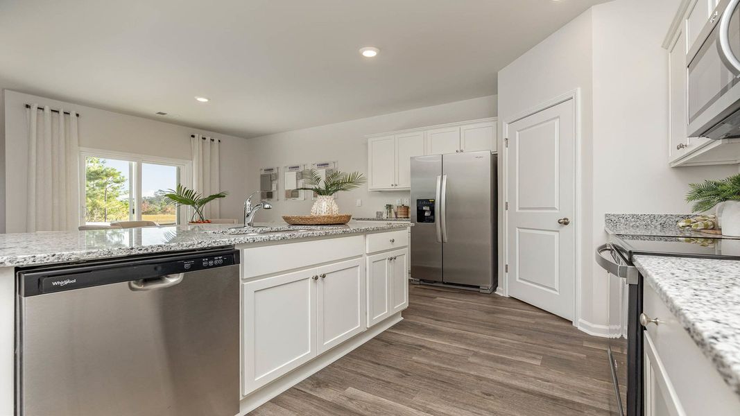 Furnished interior view inside a new home in Magnolia Farms, Florence (Image 5).
