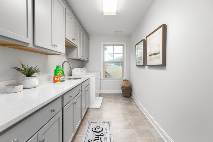 Representative furnished interior of a home built from the Hanover Lux by Keystone Homes NC in Weybridge, Burlington (Image 52).