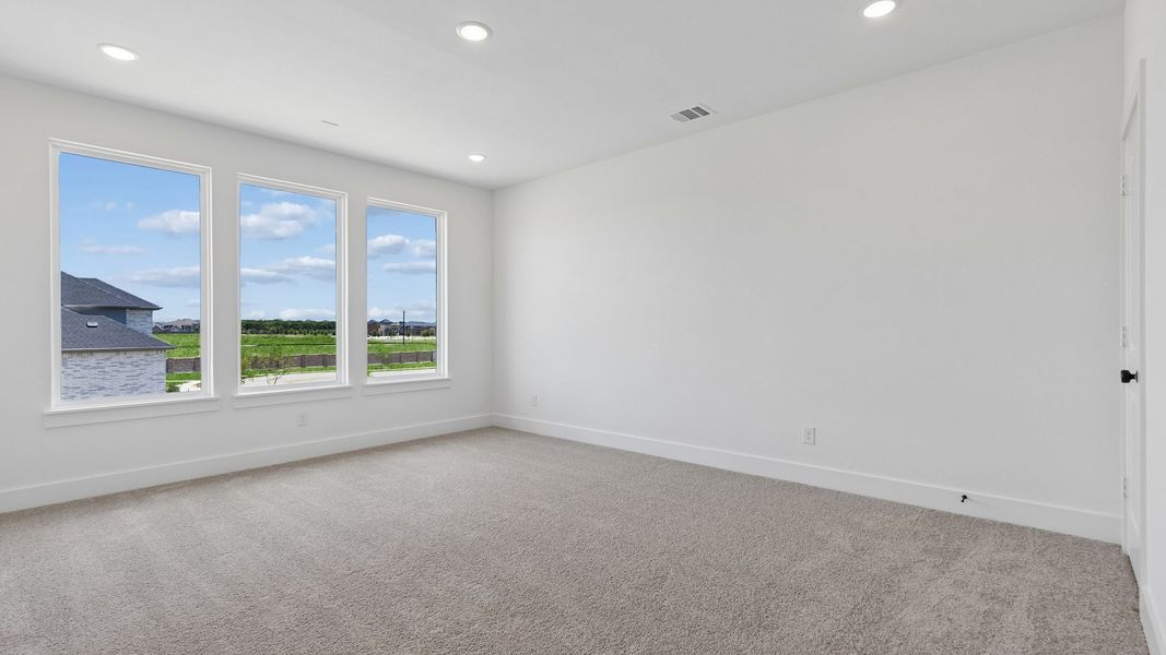 Representative unfurnished interior of a home built from the Custom II by Southgate Homes in Prosper Ridge, Prosper (Image 20).