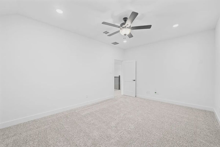 Representative unfurnished interior of a home built from the Madison by Chesmar Homes in Grange, Katy (Image 30).