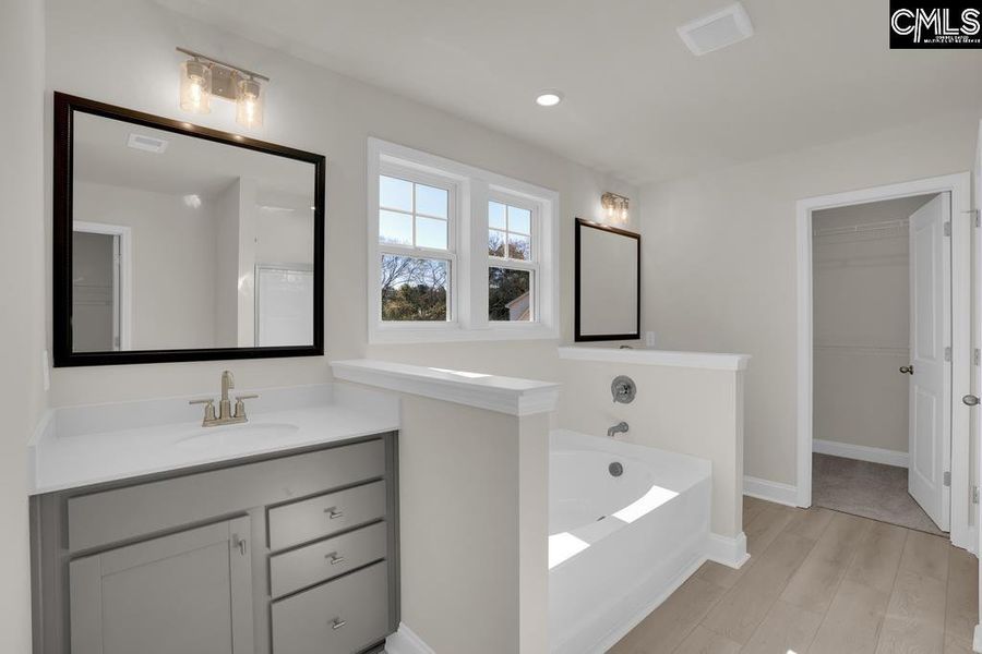 Furnished interior view inside a new home in Cottages at Roofs Pond, West Columbia (Image 8).