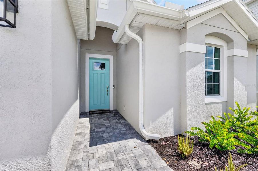 Exterior details and patio area of a home in The Sanctuary – Resort Collection, Punta Gorda (Image 3).
