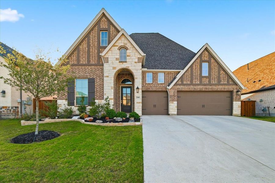 Front exterior of a new home in Watercress 65', Haslet, TX, highlighting curb appeal (Image 1). Front exterior of a new home in Watercress 65', Haslet, TX, highlighting curb appeal (Image 1).