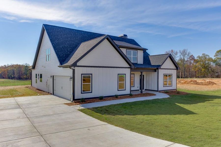 Front exterior of a new home in , Hartwell, GA, highlighting curb appeal (Image 2). Front exterior of a new home in , Hartwell, GA, highlighting curb appeal (Image 2).