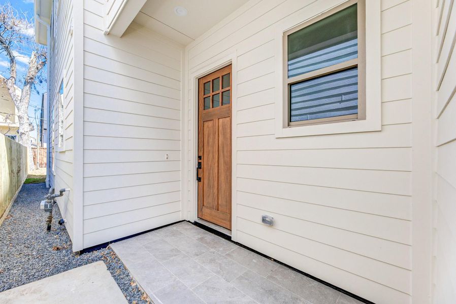 Exterior details and patio area of a home in , Houston (Image 26).