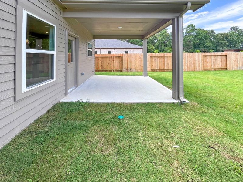 The McGinnis- Rear Covered Patio. The McGinnis- Rear Covered Patio.