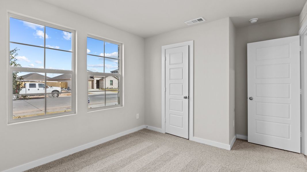 Representative unfurnished interior of a home built from the JUSTIN by D.R. Horton in Homestead at Parks Bell Ranch, Odessa (Image 17).