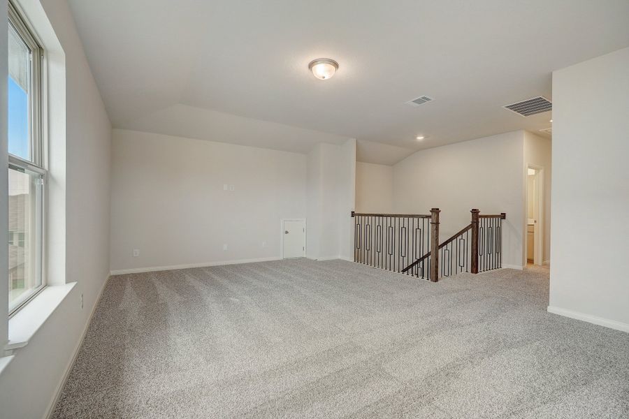 Second floor landing in the Pearl floorplan at a Meritage Homes community.