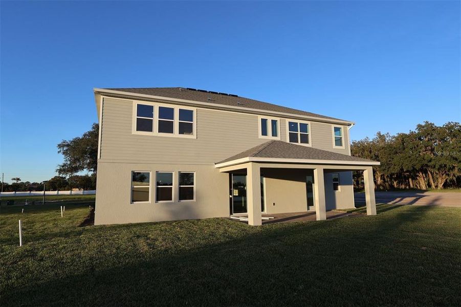 Exterior details and patio area of a home in Solace at Corner Lake, Orlando (Image 20). Exterior details and patio area of a home in Solace at Corner Lake, Orlando (Image 20).